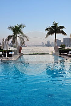 View through the pool and palms in the river Nile. Cairo, Egypt.