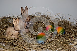 View on porcelain easter bunny on a hay