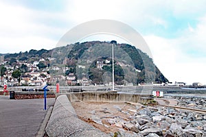 A view of Porlock hill on Exmoor from the esplanade at Minehead in Somerset photo