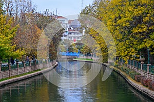 View of Porsuk River in Eskisehir.Reflection of the autumn landscape