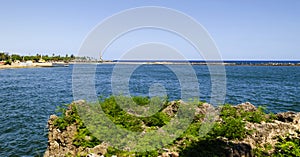 View of the port of Santo Domingo Dominican Republic from Juan Baron square, with beautiful sunny day and blue waters