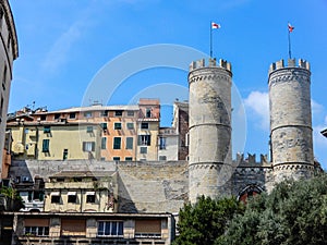 View of Porta Soprana or Saint Andrew`s Gate ith a part of old city in Genoa, Italy