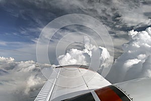 View from the porthole on the upper plane of the wing of the flying liner and the celestial landscape