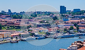 View of Porto across River Duoro towards Vila Nova de Gaia, Porto, Portugal. Vila Nova de Gaia is famed for housing