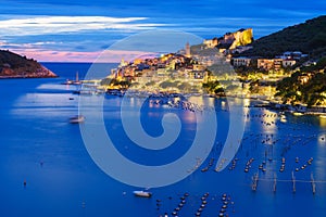 View of Portovenere or Porto Venere town on Ligurian coast at night. Italy