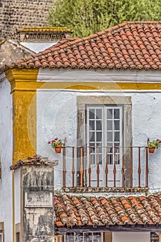 View of a Portuguese vernacular buildings on medieval village inside the fortress and Luso Roman castle of Ã“bidos