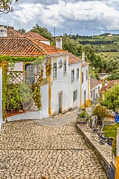 View of a Portuguese vernacular buildings on medieval village inside the fortress and Luso Roman castle of Ã“bidos