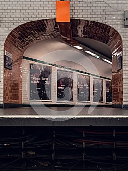 View of posters on the wall of La Courneuve station