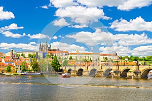 View of Prague old town, historical center with Prague Castle, St. Vitus Cathedral in Hradcany district, Charles Bridge