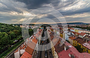 View of Prague taken from Nuselsky bridge on sunset captures typical local architecture from aerial perspective