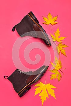 View of Premium Dark Brown Grain Brogue Derby Boots Made of Calf Leather with Rubber Sole Placed With Yellow Maple Leaves Over