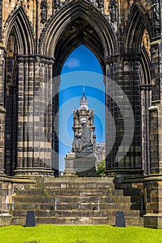 A view from Princess Street Gardens through the Gothic monuments in Edinburgh, Scotland
