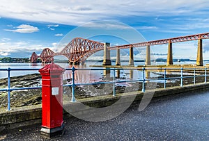 A view from the promenade in Queensferry of the Forth Railway bridge over the Firth of Forth, Scotland