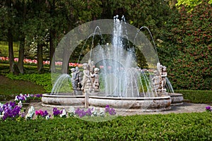 View of Putti Fountain in the botanical garden of Villa Taranto in Pallanza, Verbania, Italy.