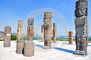 View of Pyramid of Quetzalcoatl with Toltec Warriors columns in ceremonial site Tula, Mexico