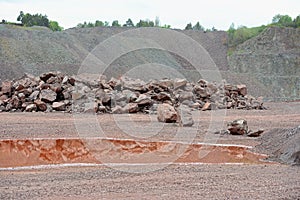 View in a quarry mine with excavator