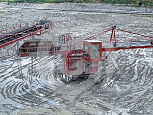 View in a quarry mine with excavator