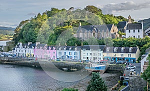 A view of Quay street in portree with port and boats