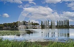 View of the quiet lake quoted in French village of Combourg. photo