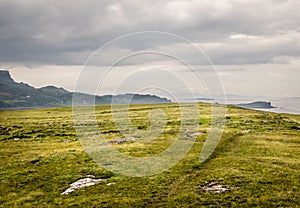 A view of Quirang hiils in the distance from the walking path from Staffin village to Staffin harbour and An Corran Beach