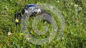 View of radio controlled model  racing car on off-road background. Toys with remote control. Free time.