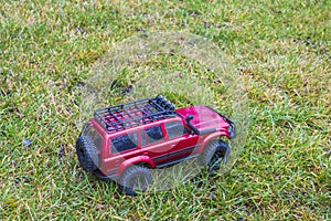 View of radio controlled model  racing car on off-road background. Toys with remote control. Free time.