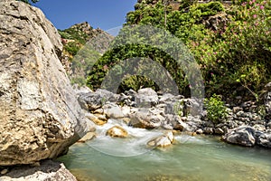 View of the Raganello River below il Ponte del diavolo pathway in Civita