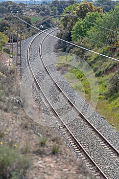 View of railroad rails with rails and catenary