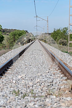 View of railroad rails with rails and catenary