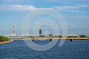 View of railway bridge over Daugava river and Riga Radio and Television Tower. Riga, Latvia