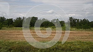 View from the railway car to the landscape passing outside the train window