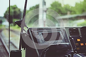 View of the railway from the driver`s cab of an electric train i