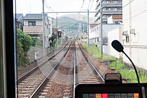 View of Railway and Mountain from Inside Train