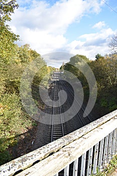 View of the railway track seen from an old bridge - photo taken in Leamington Spa, UK