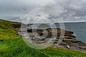 View of a rainy day in the coastal walk route from Doolin to the Cliffs of Moher