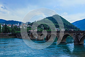 View in the Rainy Day to the historic Mehmed PaÅ¡a SokoloviÄ‡ Bridge Bridge in ViÅ¡egrad, over the Drina River