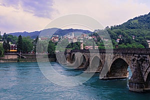 View in the Rainy Day to the historic Mehmed PaÅ¡a SokoloviÄ‡ Bridge Bridge in ViÅ¡egrad, over the Drina River