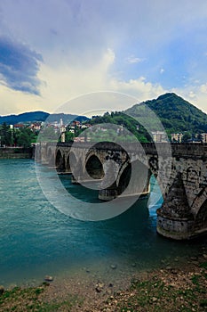 View in the Rainy Day to the historic Mehmed PaÅ¡a SokoloviÄ‡ Bridge Bridge in ViÅ¡egrad, over the Drina River