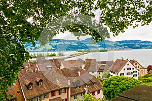 View of Rapperswil red tile roofs and Zurich lake. Rapperswil, S