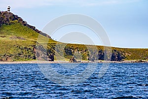 View of Rausu lighthouse on the cliff along Shiretoko Peninsular