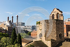 View of the Raval neighborhood in Barcelona: Sant Pau del Camp church, the oldest church in the city of Barcelona, and the three photo