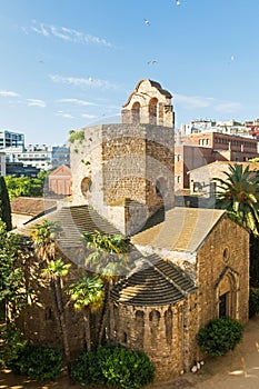 View of the Raval neighborhood in Barcelona: Sant Pau del Camp church, the oldest church in the city of Barcelona photo