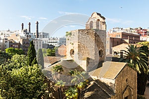 View of the Raval neighborhood in Barcelona: Sant Pau del Camp church, the oldest church in the city of Barcelona photo