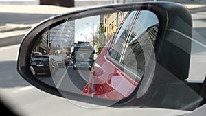 View of the rear view mirror in a city car