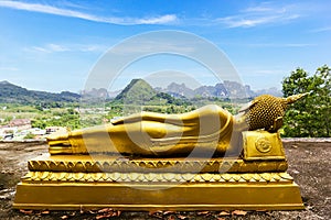 View of Reclining Buddha staute at Guan Yin Bodhisattva Mountain in Krabi photo