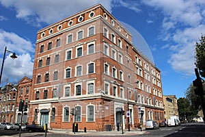 Cleaned red brick office block building