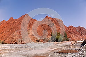 View of red mountains of Oytagh Canyon, along the Karakoram Highway from Kashgar to Tashkurgan, Xinjiang Uyghur Autonomous Region