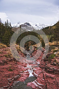 View of the Red Rock Canyon in Waterton Lakes National Park from the bridge across the river