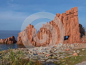 view of Red Rocks called Rocce Rosse at mediterranean sea coastline in Arbatax port, penisula of Tortoli, Ogliastra