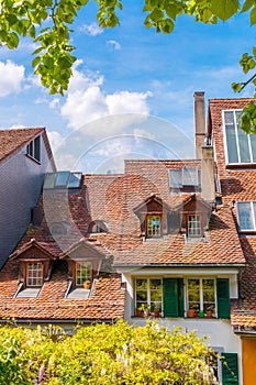 View of red tile roofs on old historical houses in Thun city, S